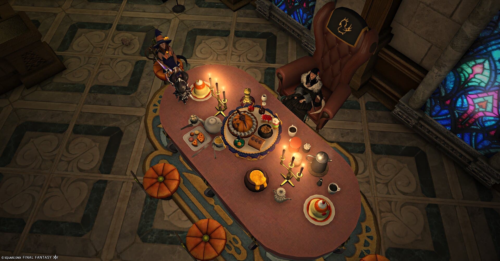 The table seen from above, laid end to end with pumpkins, cakes and candlesticks, a guest seated at each end