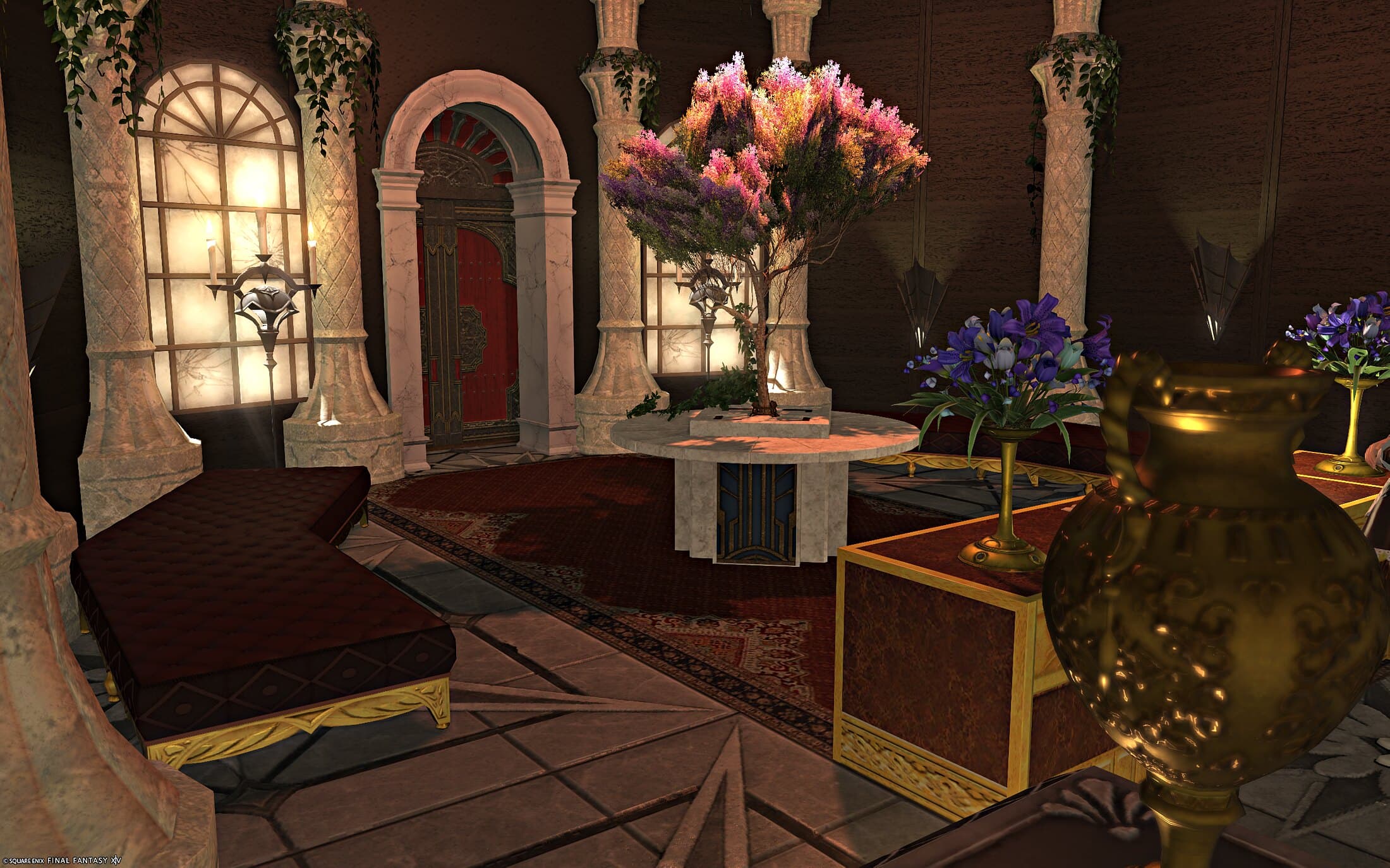 The entrance seen wide — ivory pillars wrapped in ivy, dark red cushioned benches, gold chests and vases of purple flowers