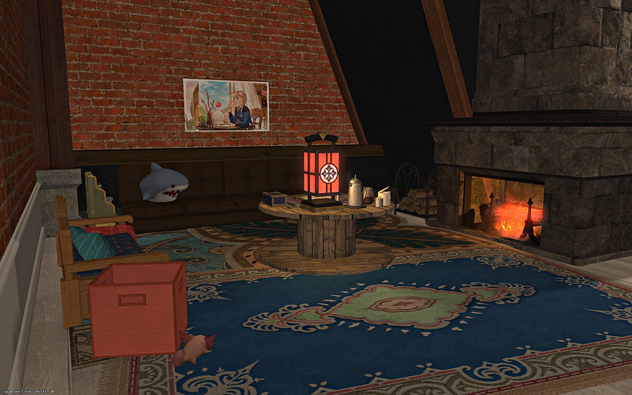 The den seen wide — brick wall, cushioned bench, storage box and framed pictures under an A-frame ceiling