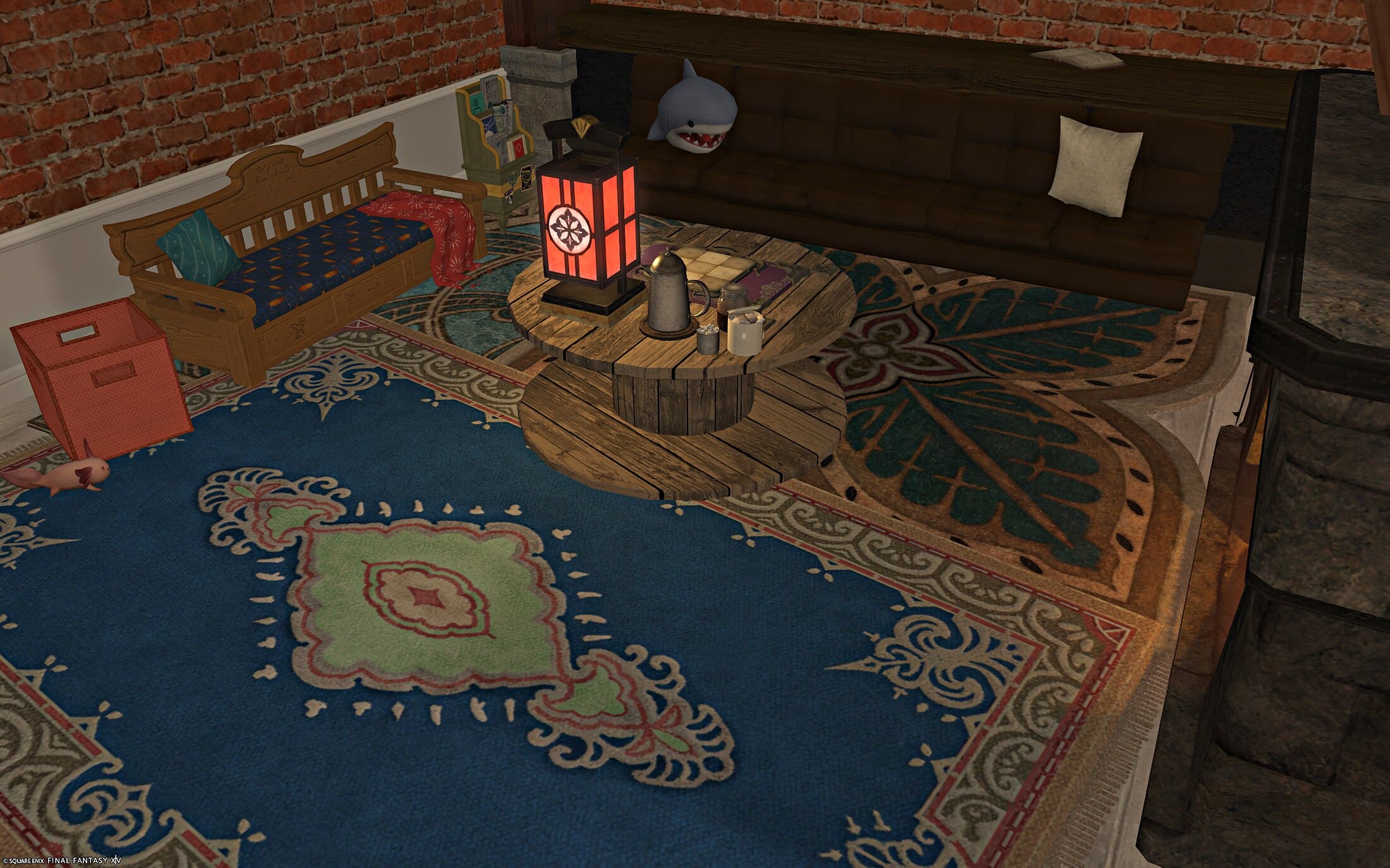 The den from the opposite corner, layered rugs running under the bench seating