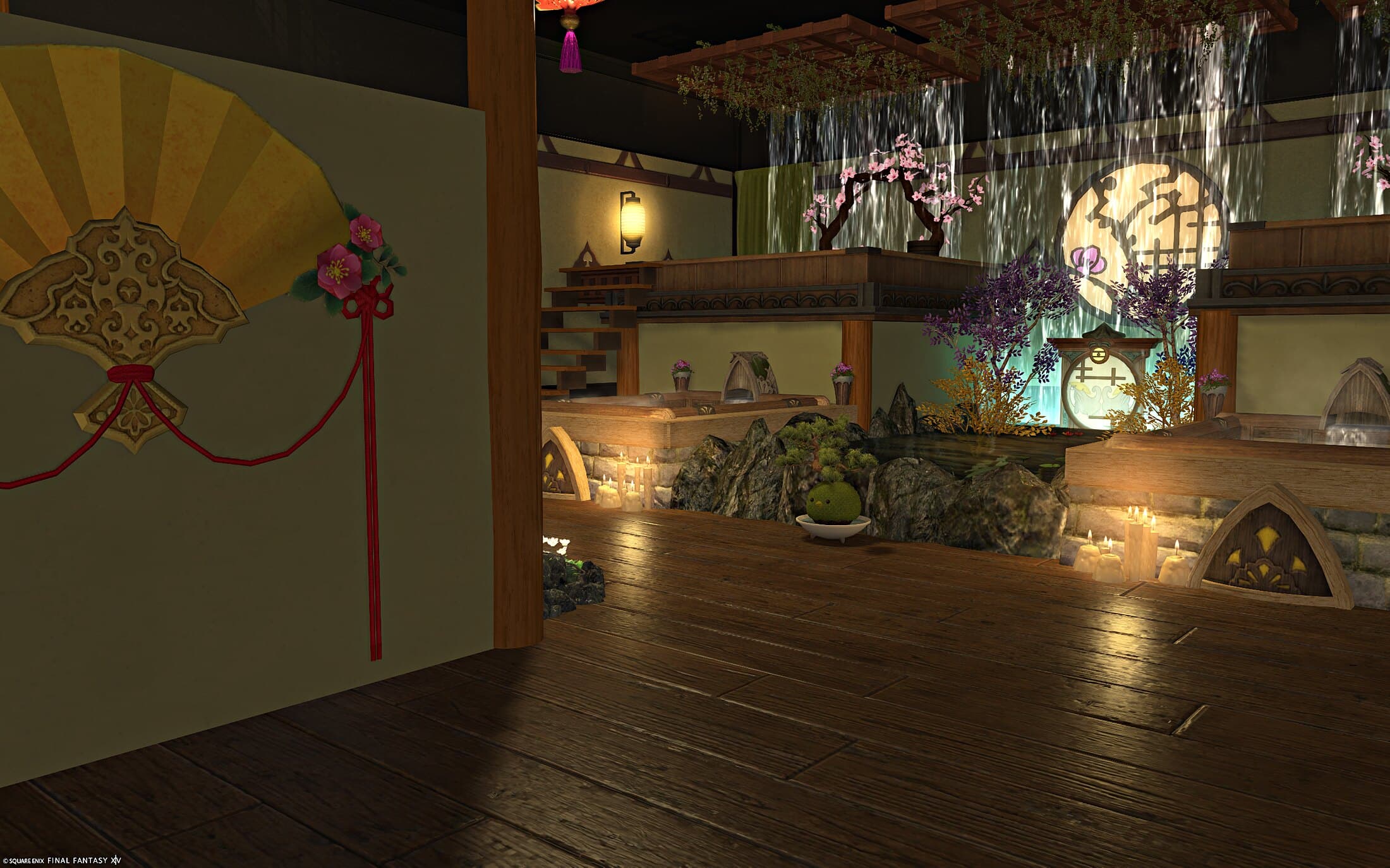 A folding fan with a red tassel hung on the wall by the entrance, the wooden floor and the bath hall opening out beyond it