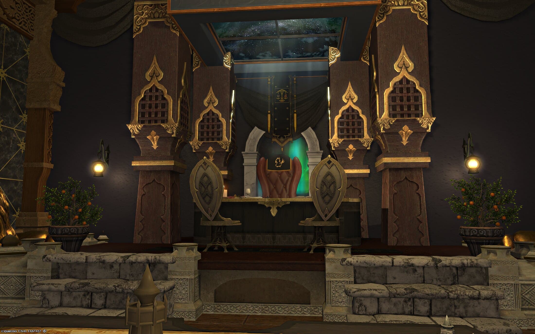 The front of the dais — carved pillars, hanging shields, potted orange trees and the stone balustrade closing it off