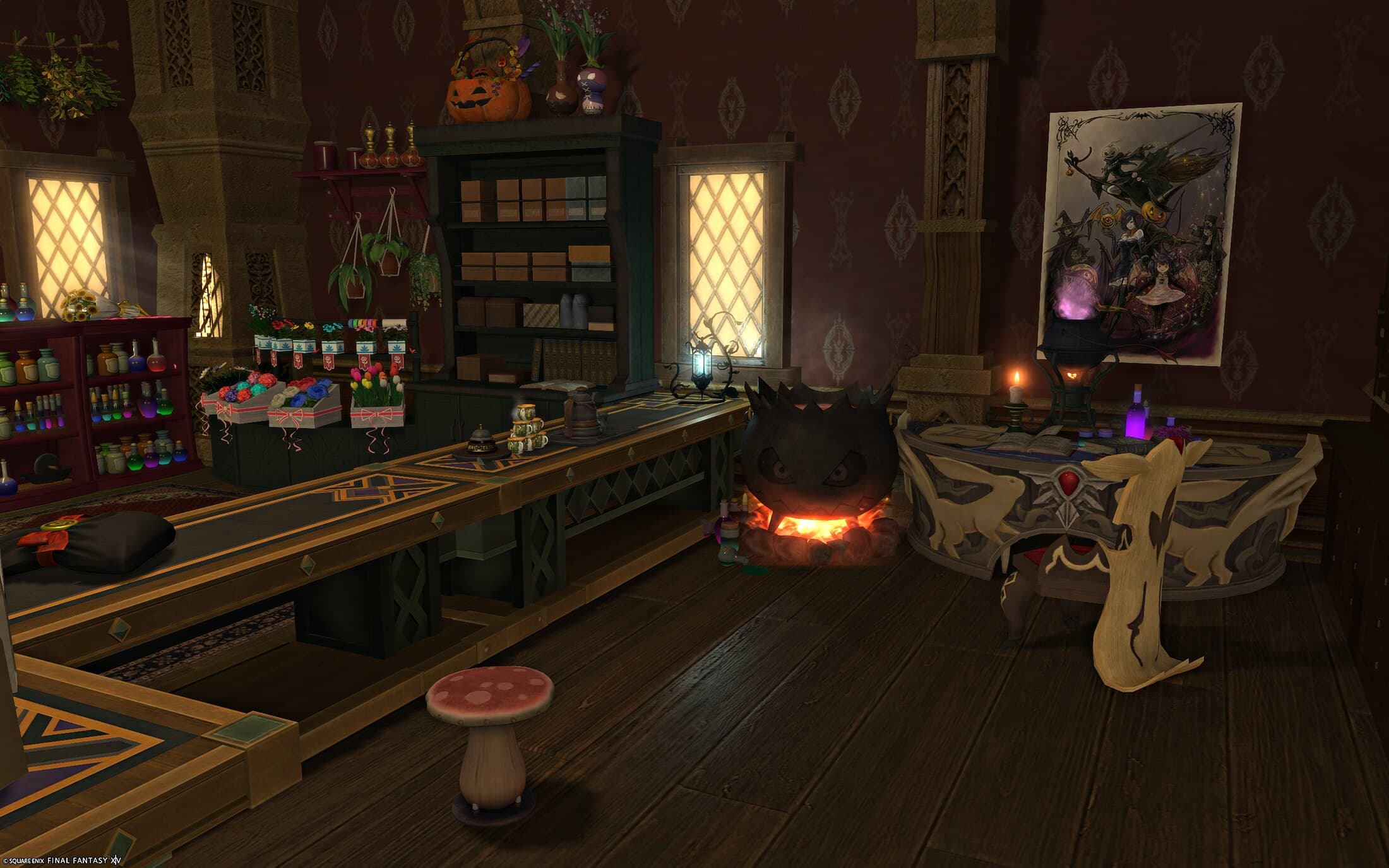 The counter's working end, with a fanged cauldron glowing at floor level and a draped round table beside it