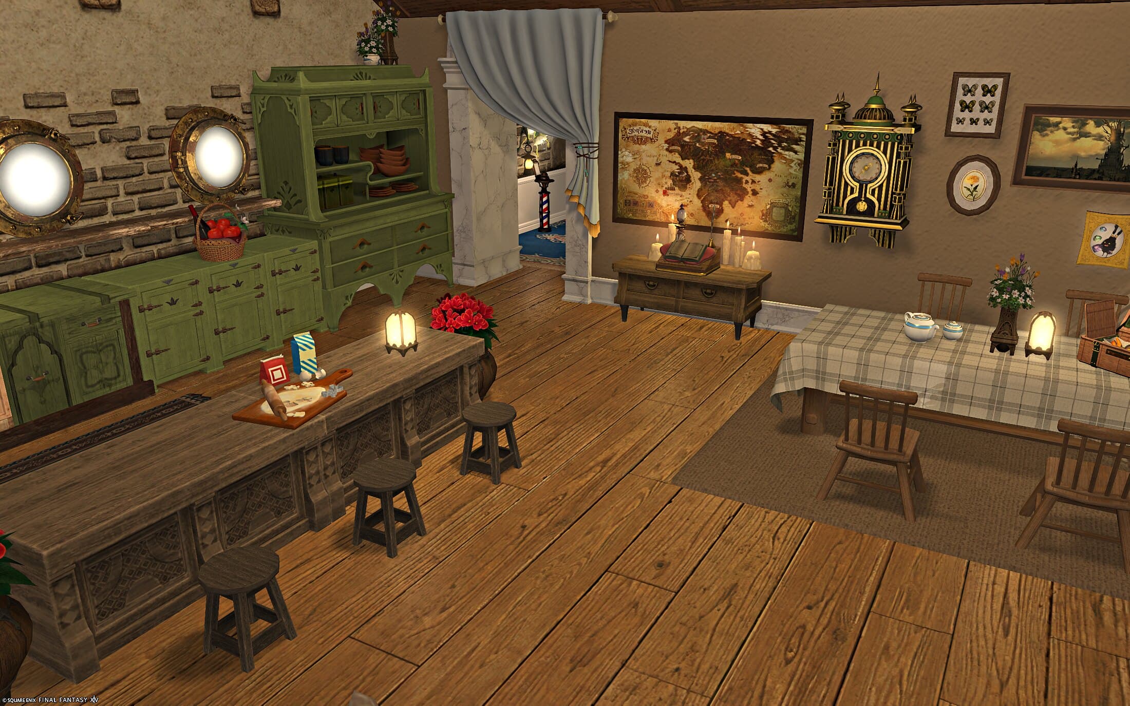 The kitchen counter and dining table seen together, a wrapped gift on the counter and a lighthouse figure visible through a doorway at the back of the hall