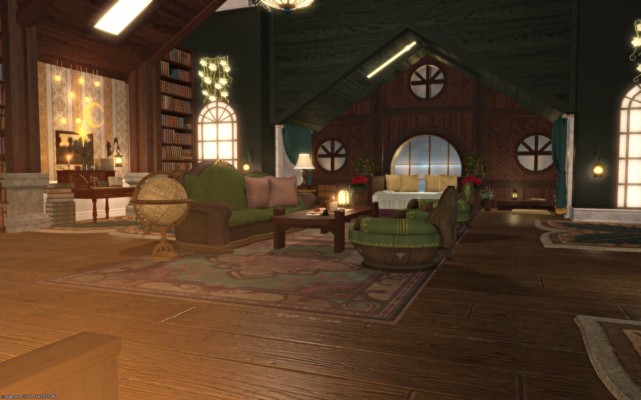 The living room seen wide, a globe and green sofa in the foreground, the desk's moon and star lights and the bed's round window both visible beyond