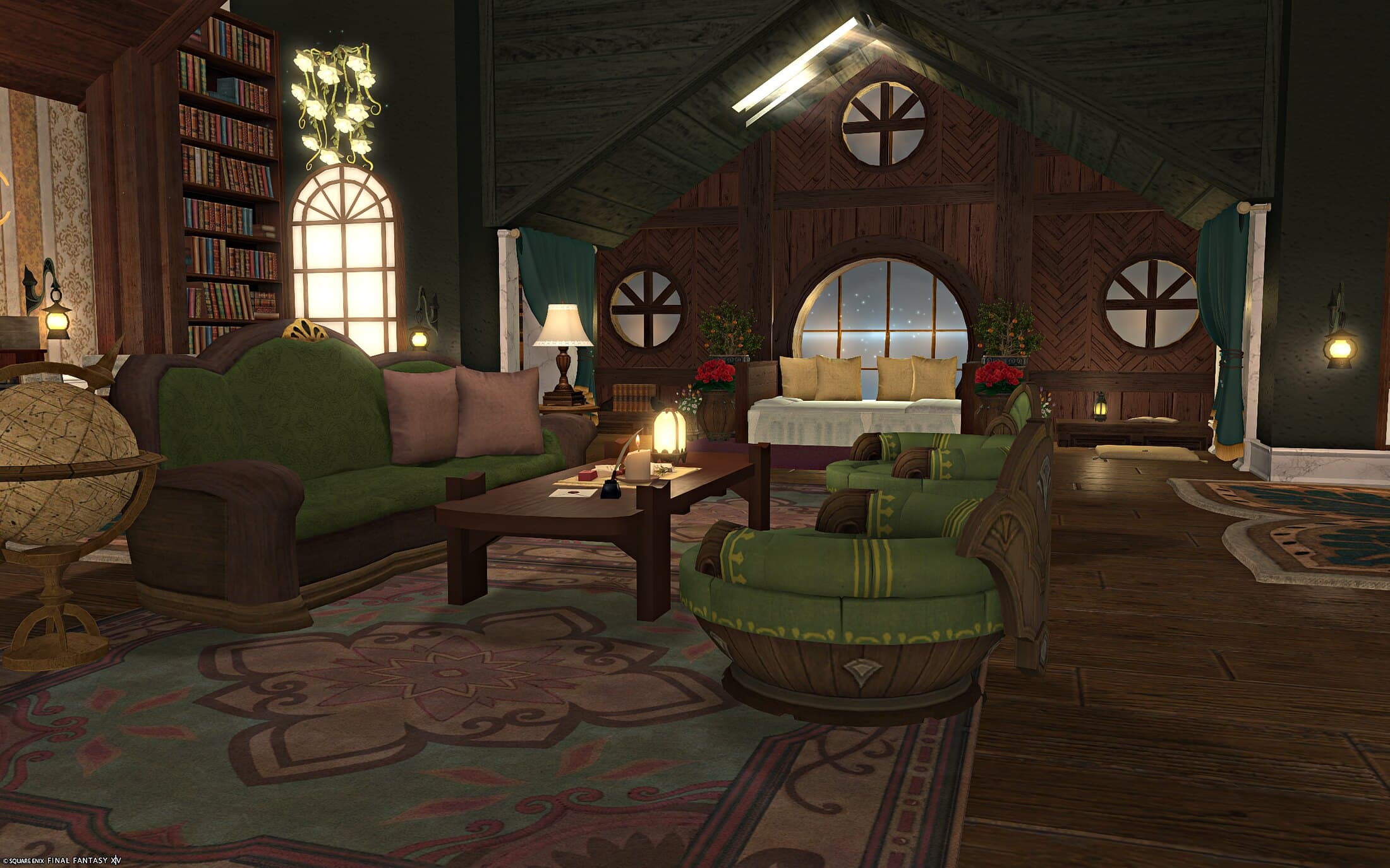 The sofa and armchairs from another angle, bookshelves and the round desk window at the left, the bed and its mirrored round window at the right
