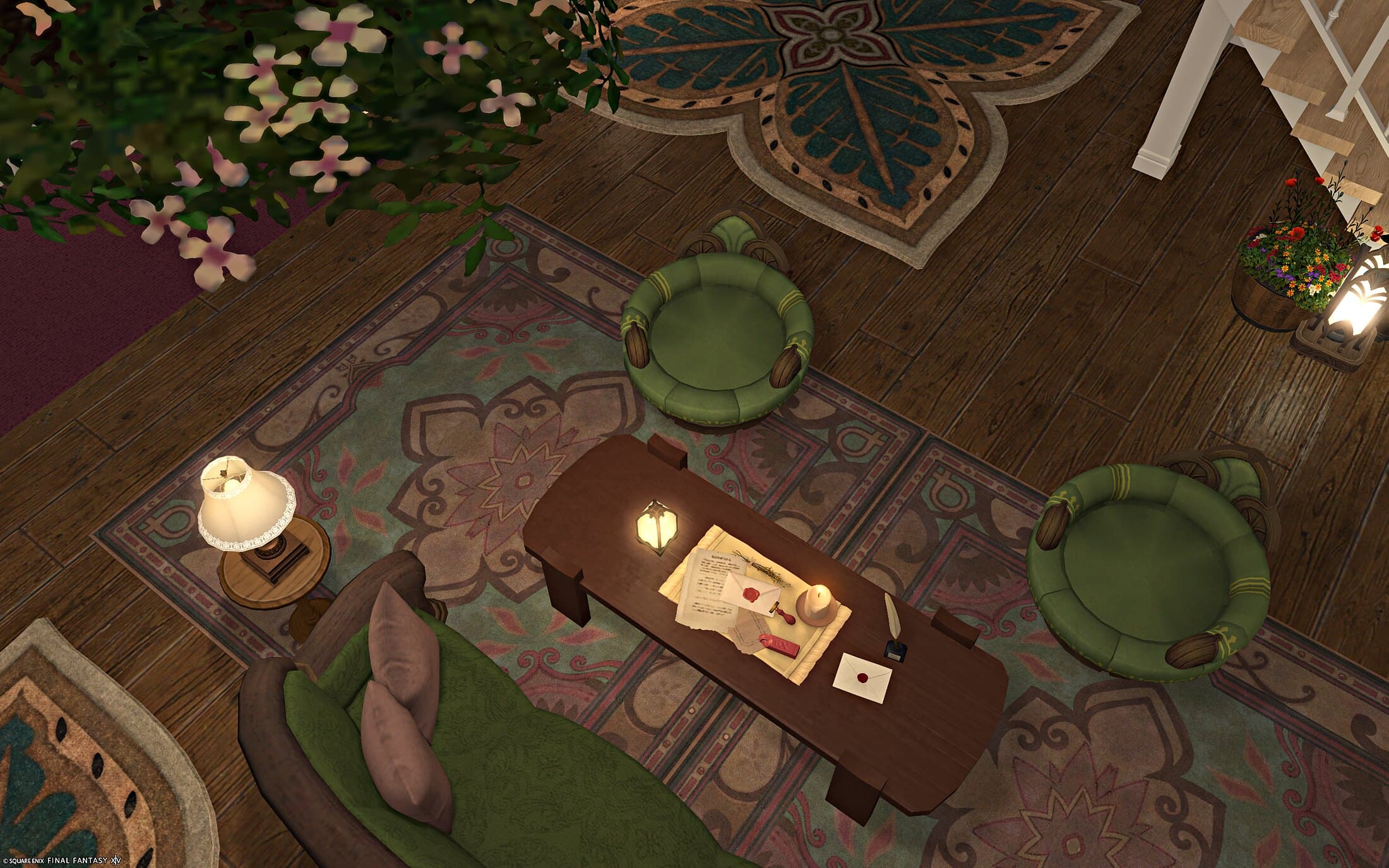 The coffee table from above, a lit candle, dice and papers laid on it, a rose-patterned rug and two round tufted ottomans around it