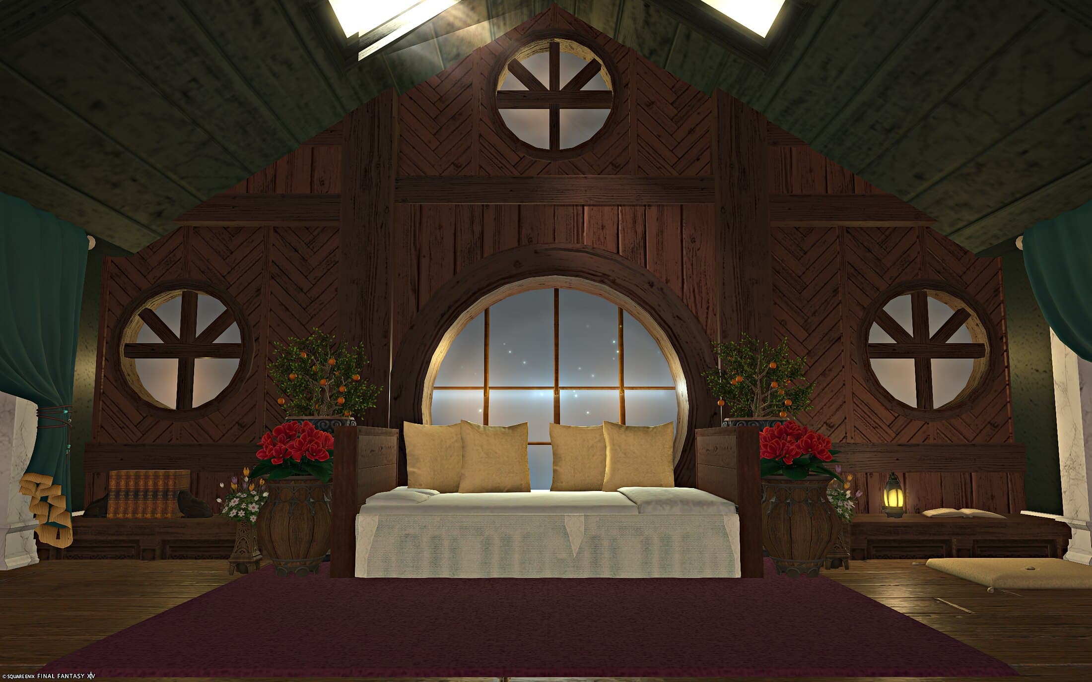 The bed straight on, a round window centred above it showing stars, potted flowers either side and matching round windows in the walls to either side