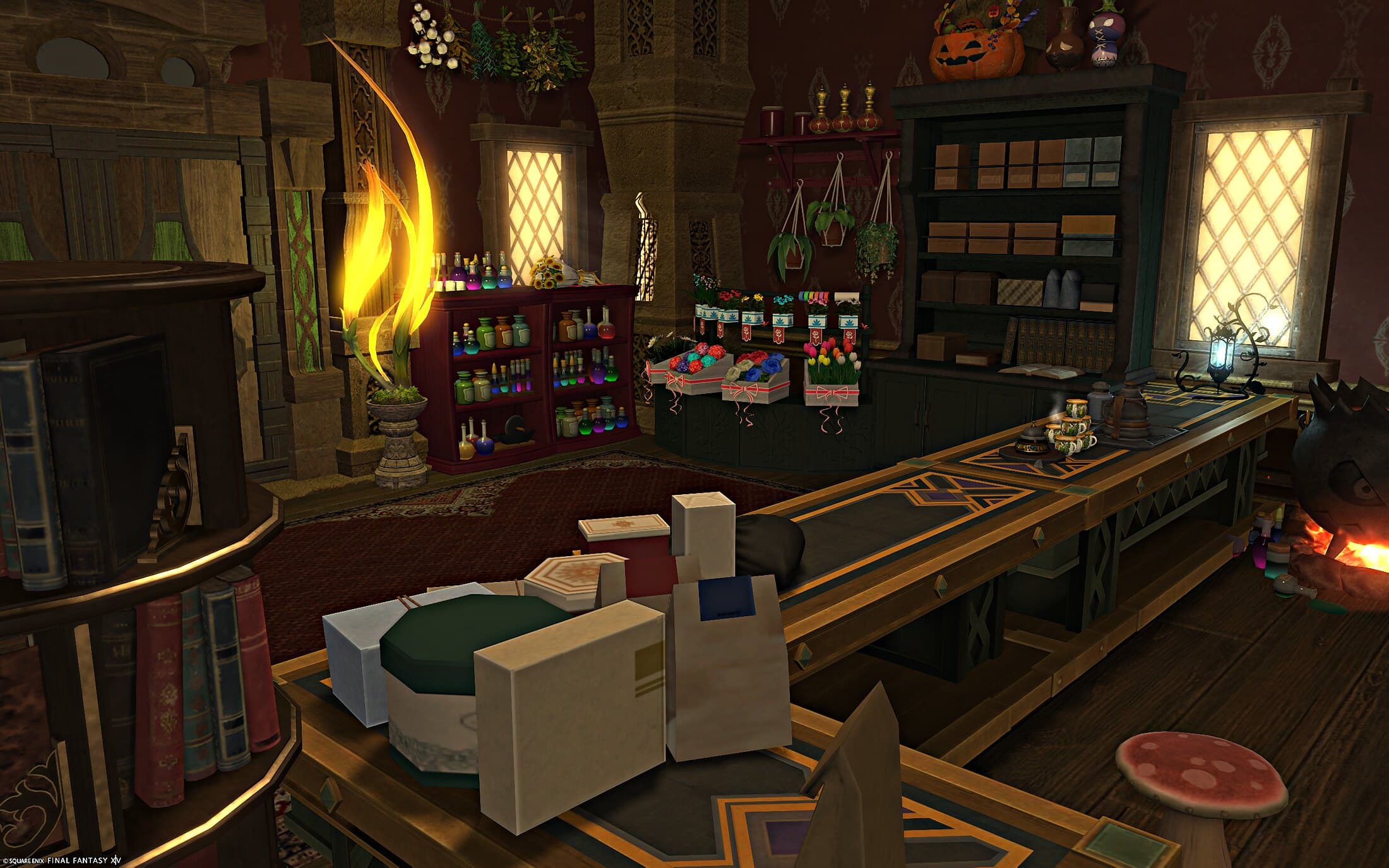 The shop floor along the counter — boxed goods stacked ready to go out, a rack of coloured potions and an open flame beyond